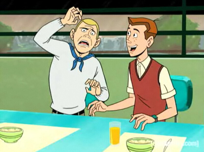 Two boys at a breakfast table
