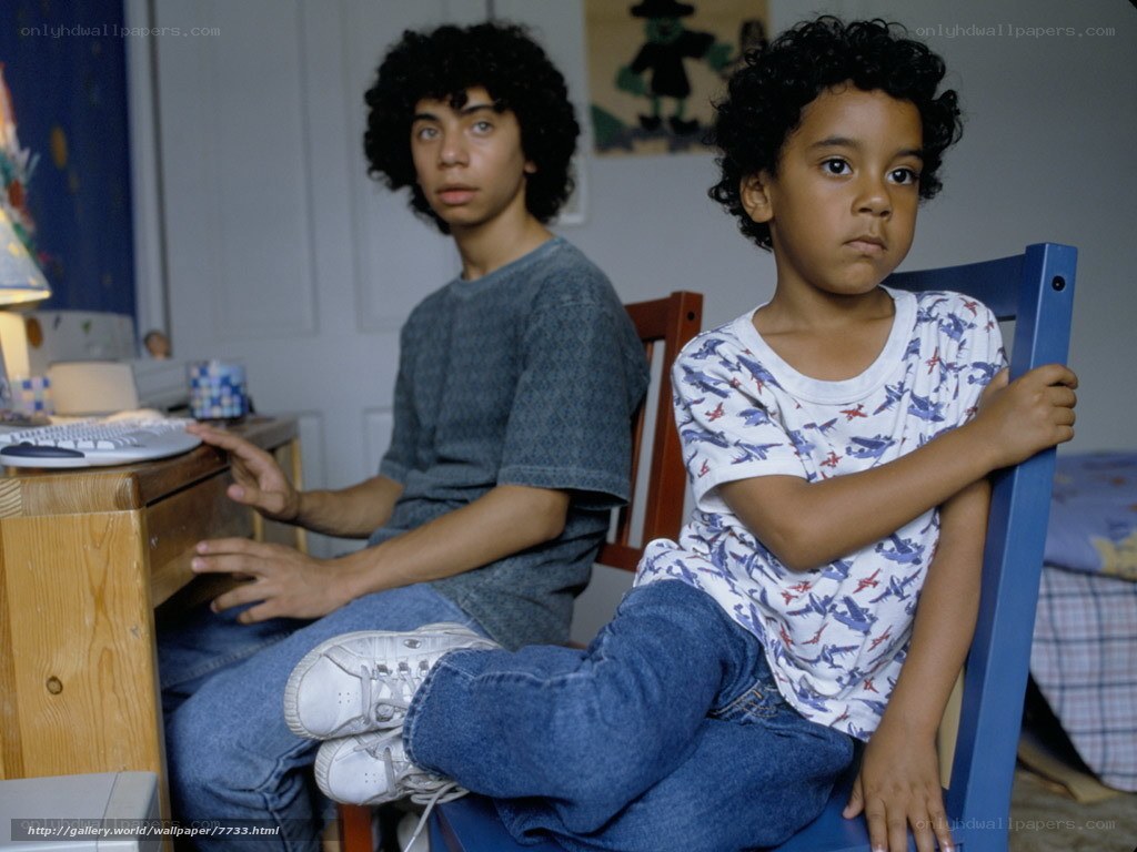 Two boys at a computer desk