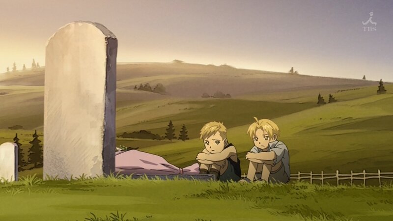 Two boys at a grave