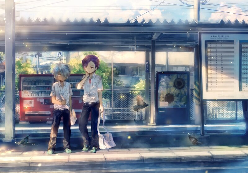 Two boys at a train station