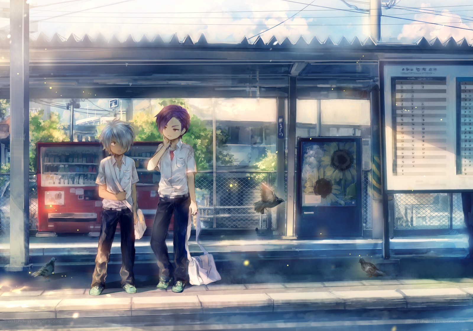 Two boys at a train station