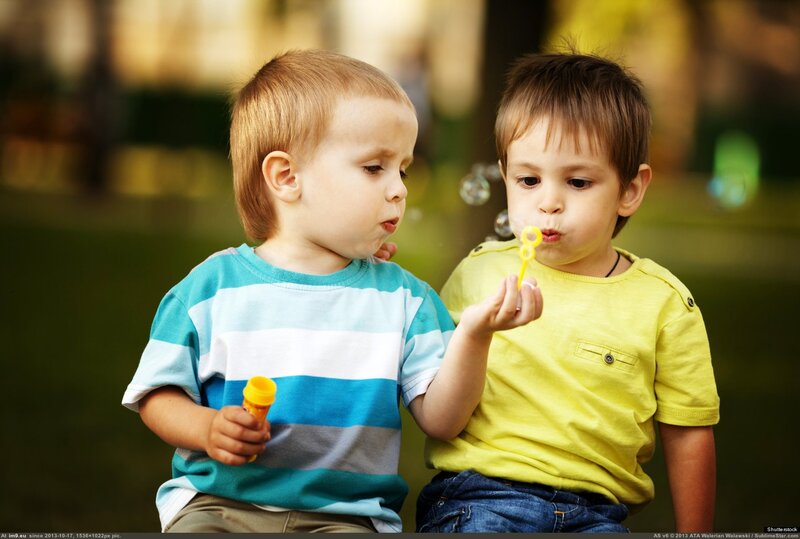 Two Boys Blowing Bubbles
