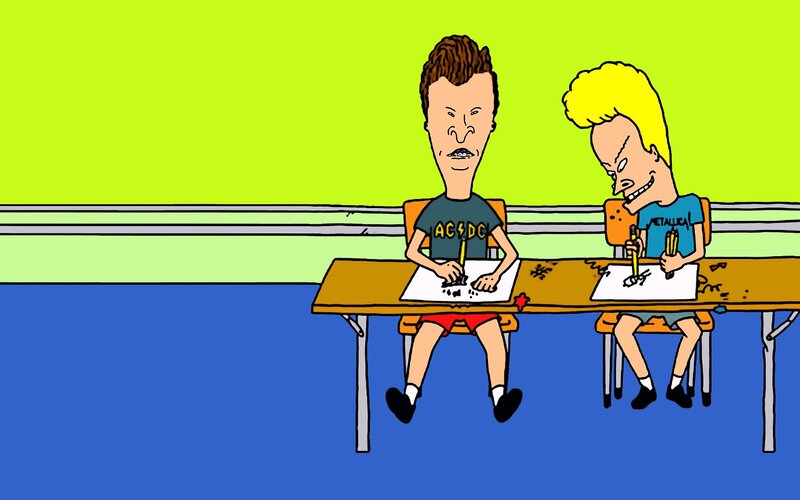 Two Boys Drawing at Desks