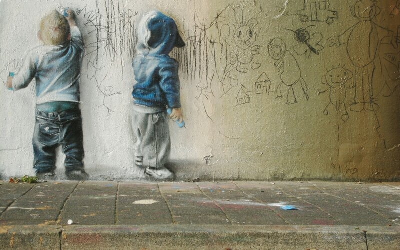 Two Boys Drawing on Wall