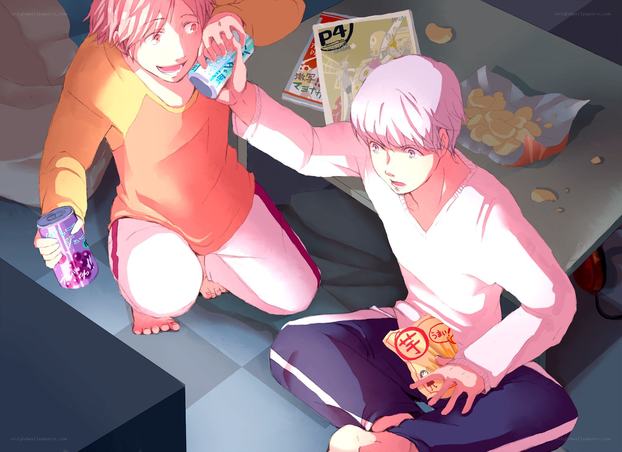 Two boys eating snacks