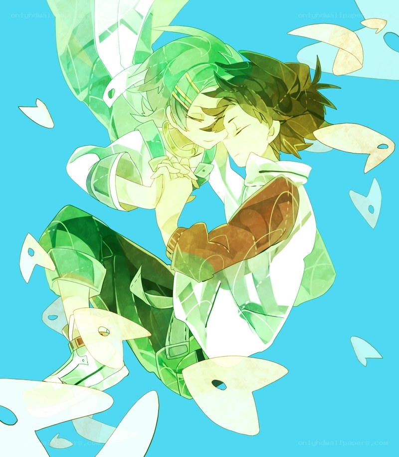 two boys embracing in green