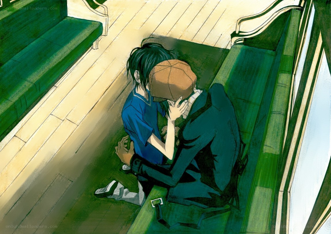 two boys embracing on a train