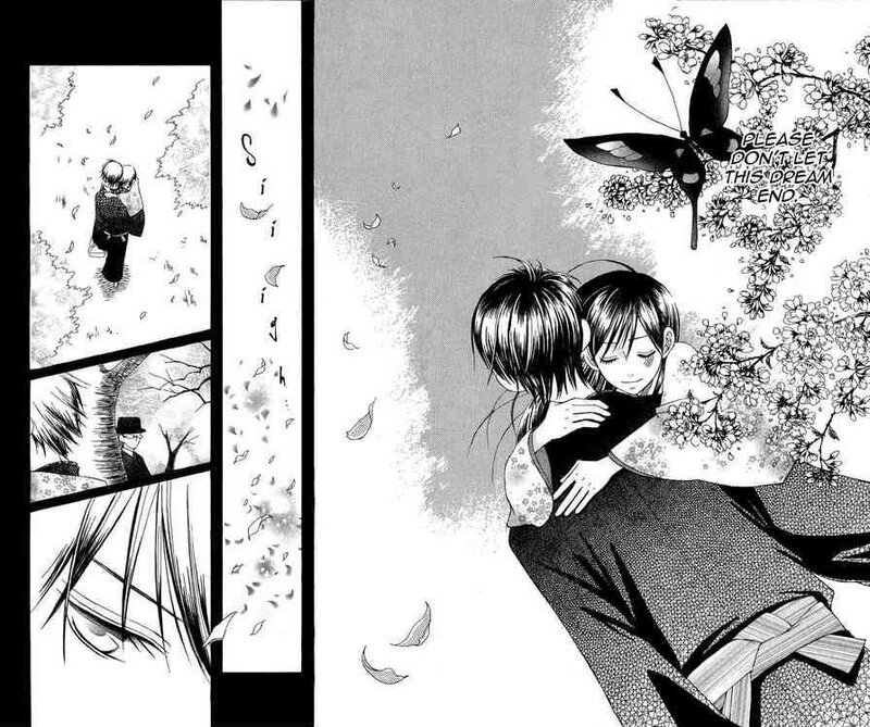 two boys hugging under cherry blossoms