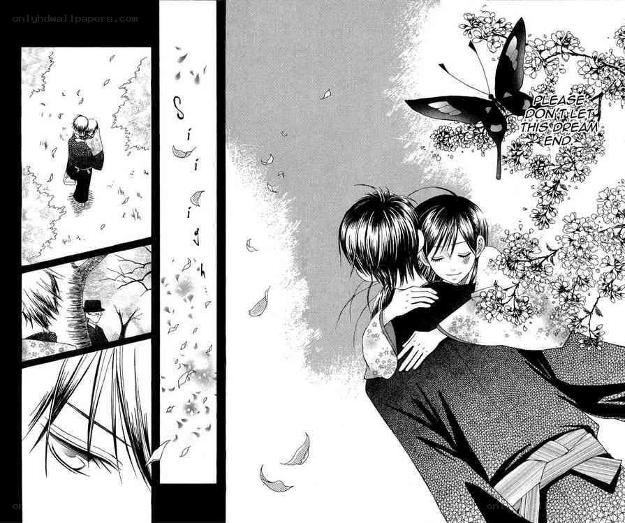 two boys hugging under cherry blossoms