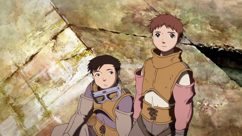 two boys in a cave