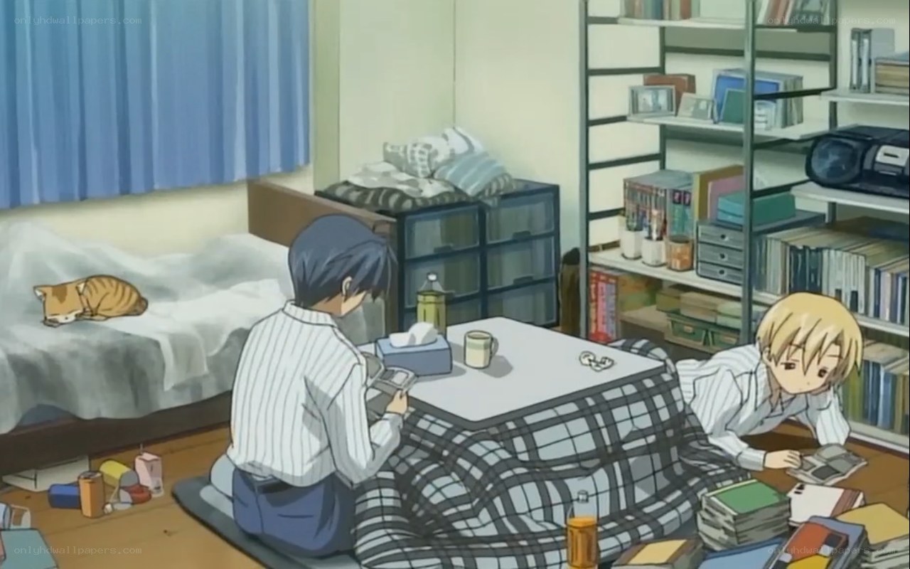 Two boys in a cluttered room