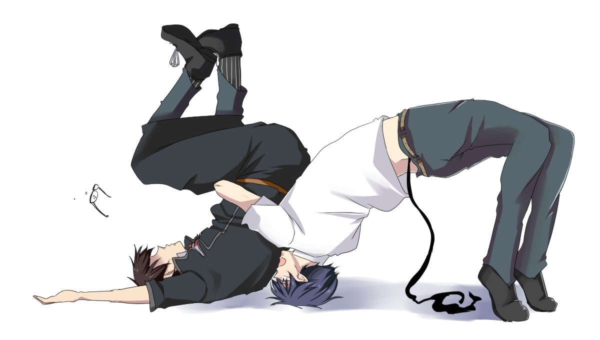 Two boys in a playful tangle