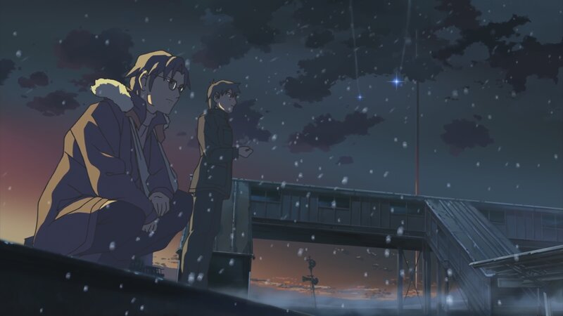 two boys in snow at dusk