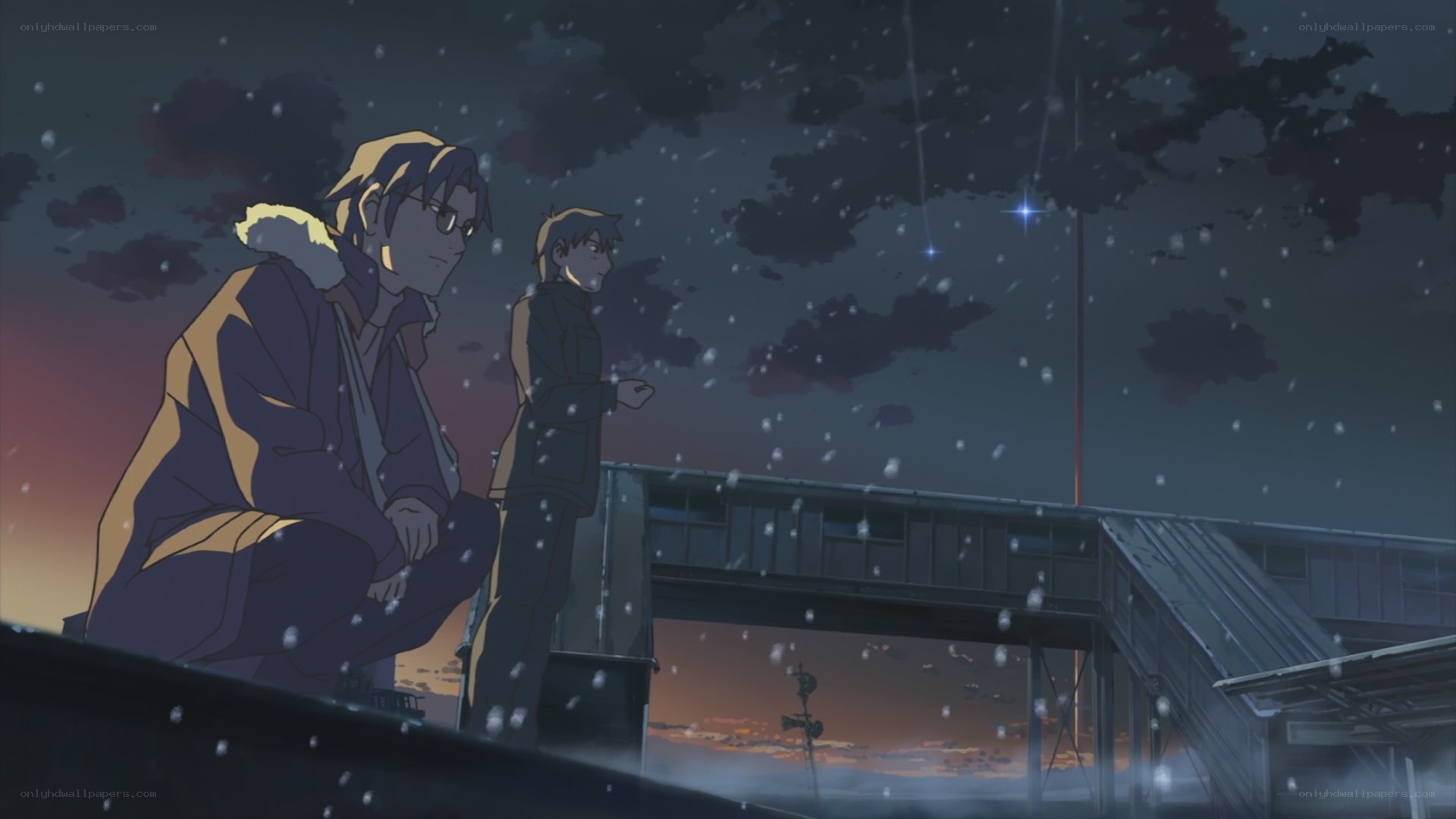 two boys in snow at dusk