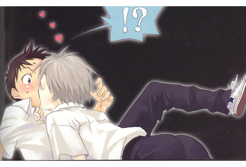 Two boys kissing