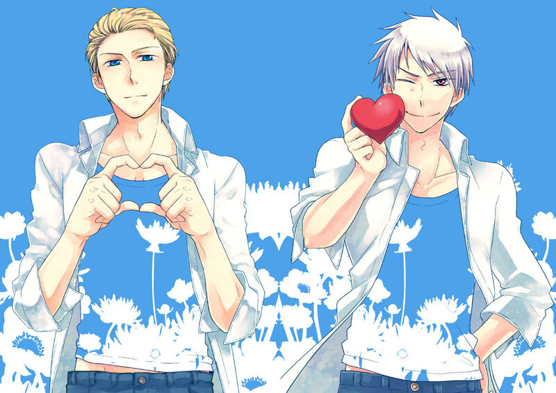 two boys making heart gestures