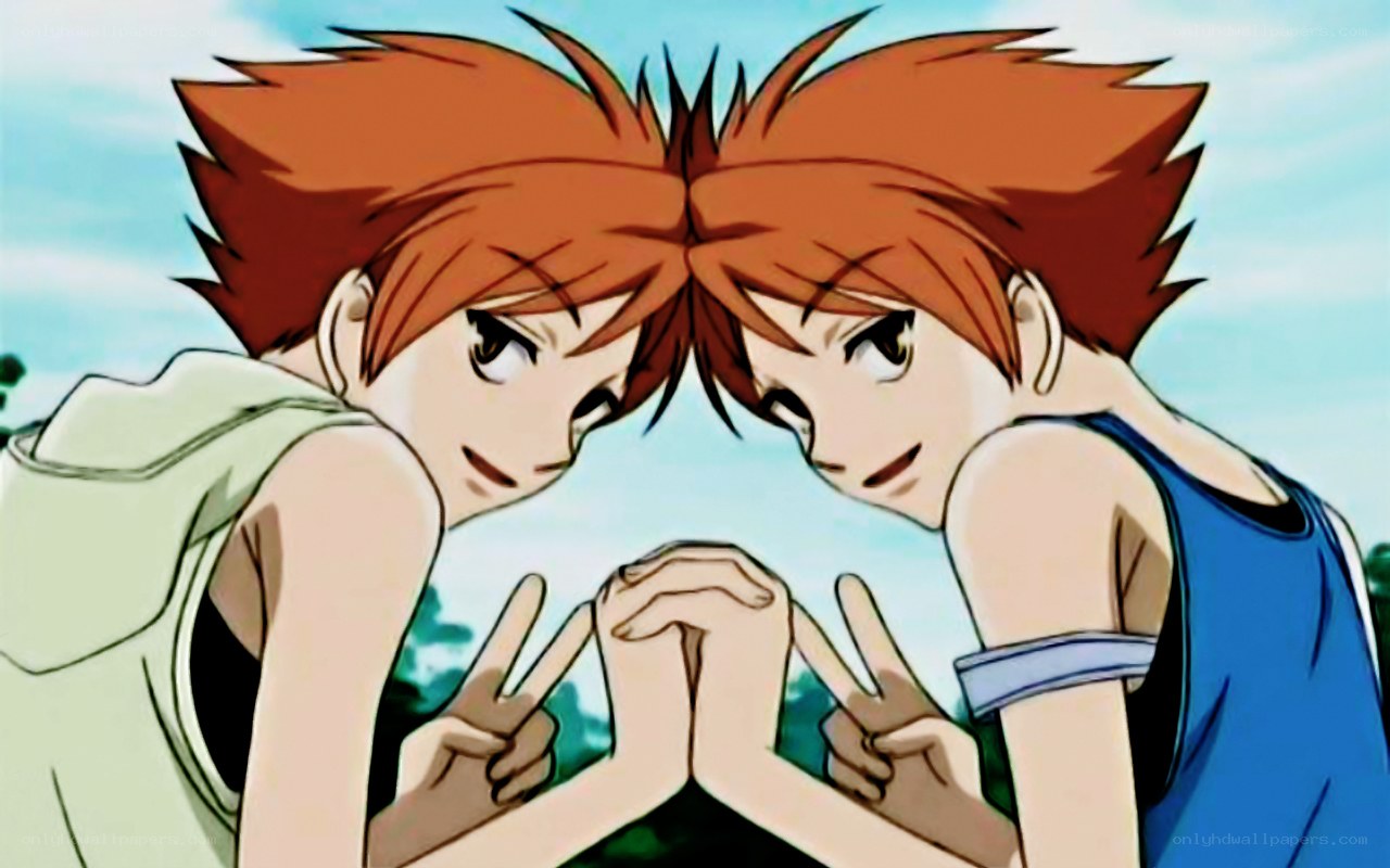 two boys making peace signs