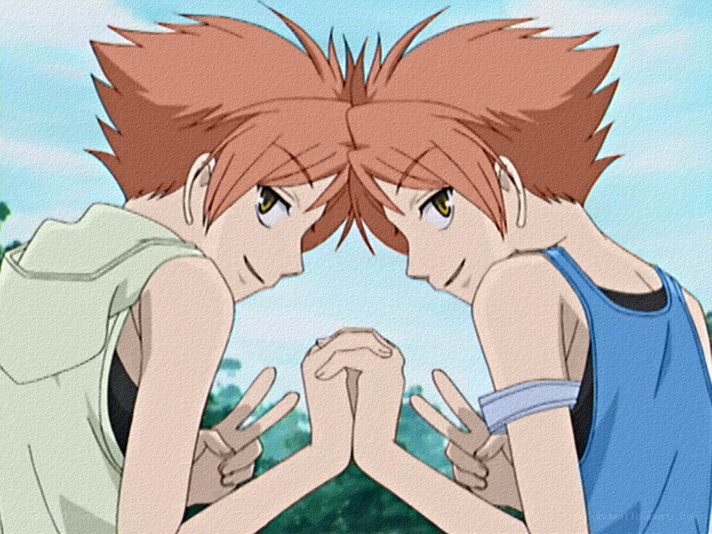 two boys making peace signs
