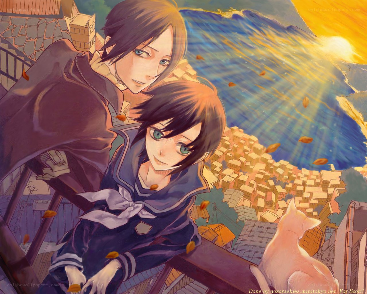 Two boys on a balcony at sunset