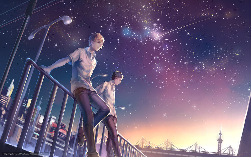 Two boys on a bridge at night