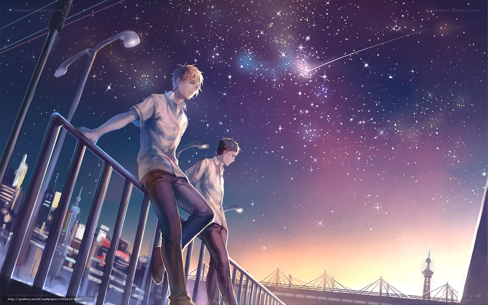 Two boys on a bridge at night