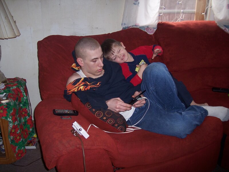 Two Boys on a Couch — Red