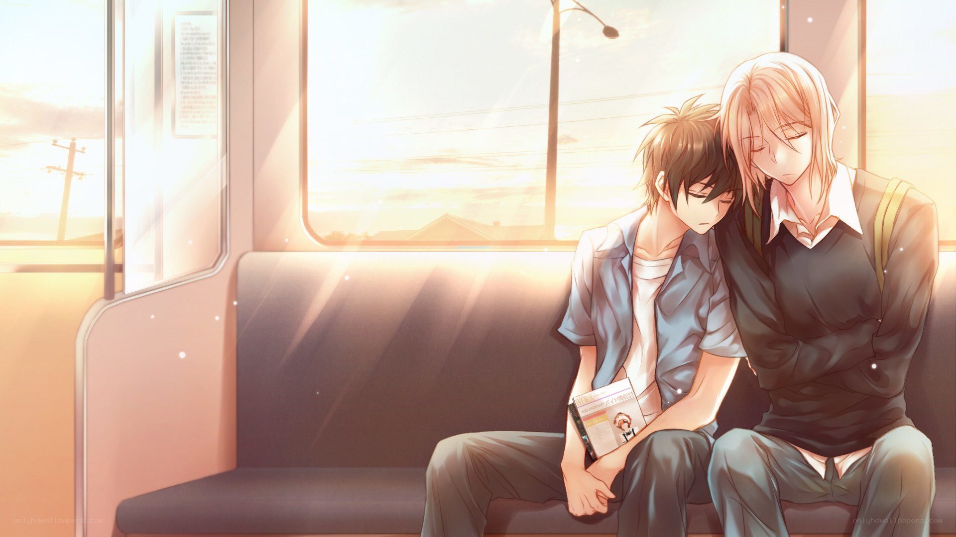 Two boys on a train at sunset