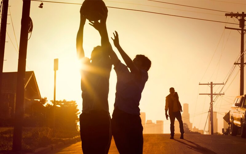 Two Boys Playing Basketball