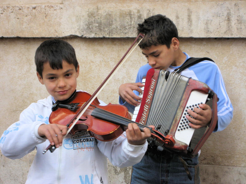 Two Boys Playing Instruments