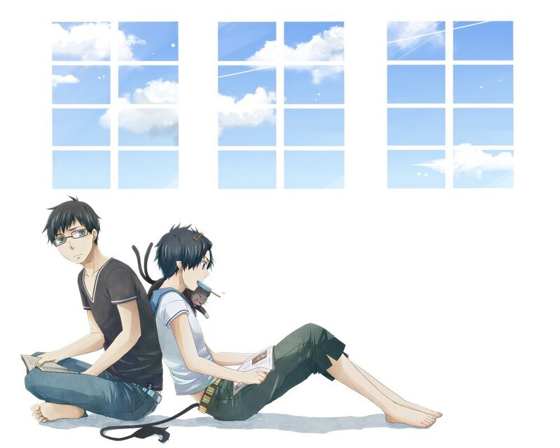 Two boys reading by the window