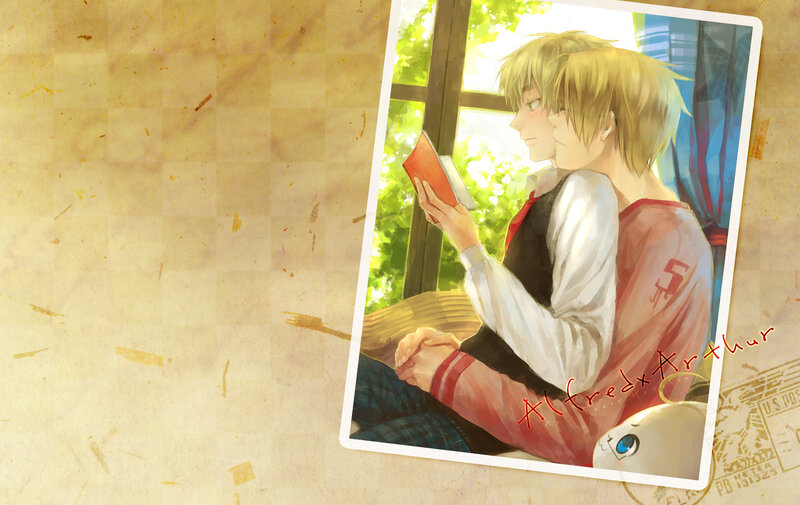 Two boys reading together