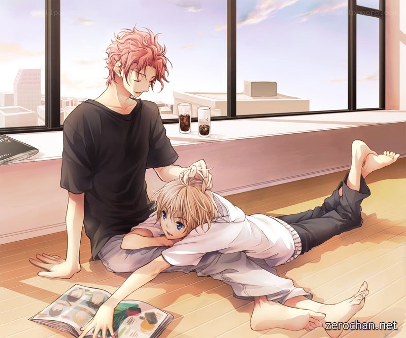 Two boys relaxing on the floor