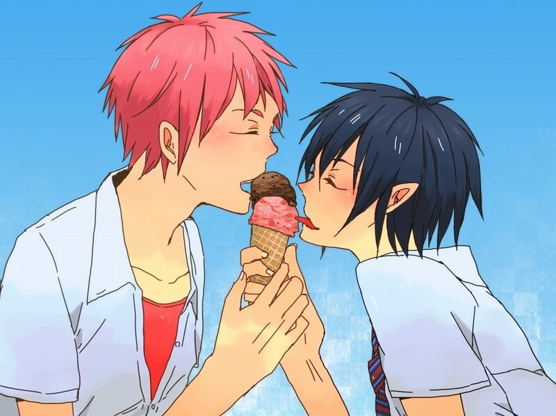 Two boys sharing ice cream