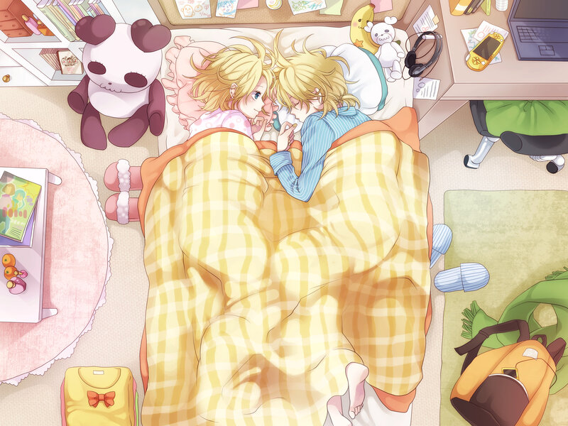 Two boys sleeping in bed