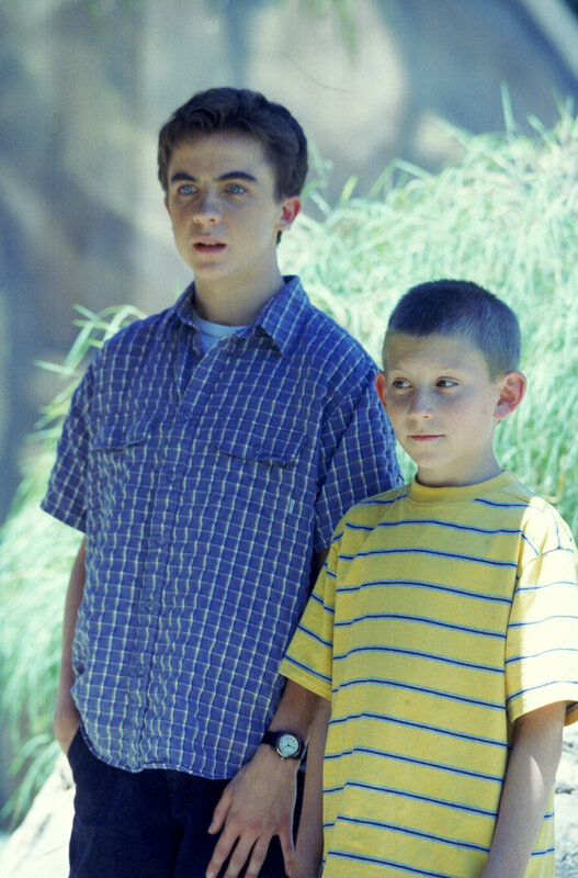 two boys standing together