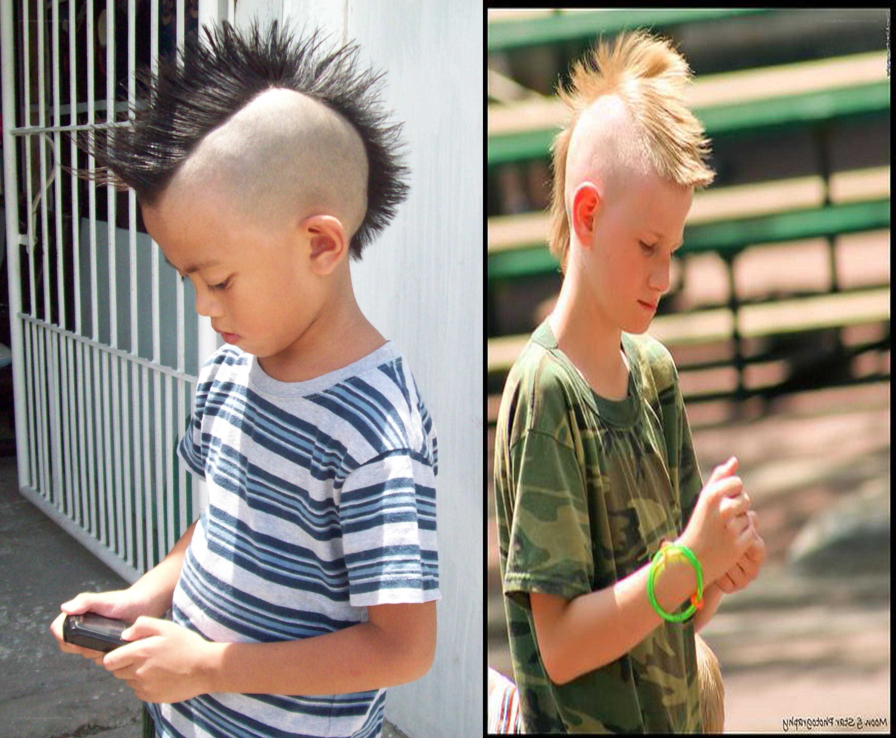 two boys with mohawk hairstyles