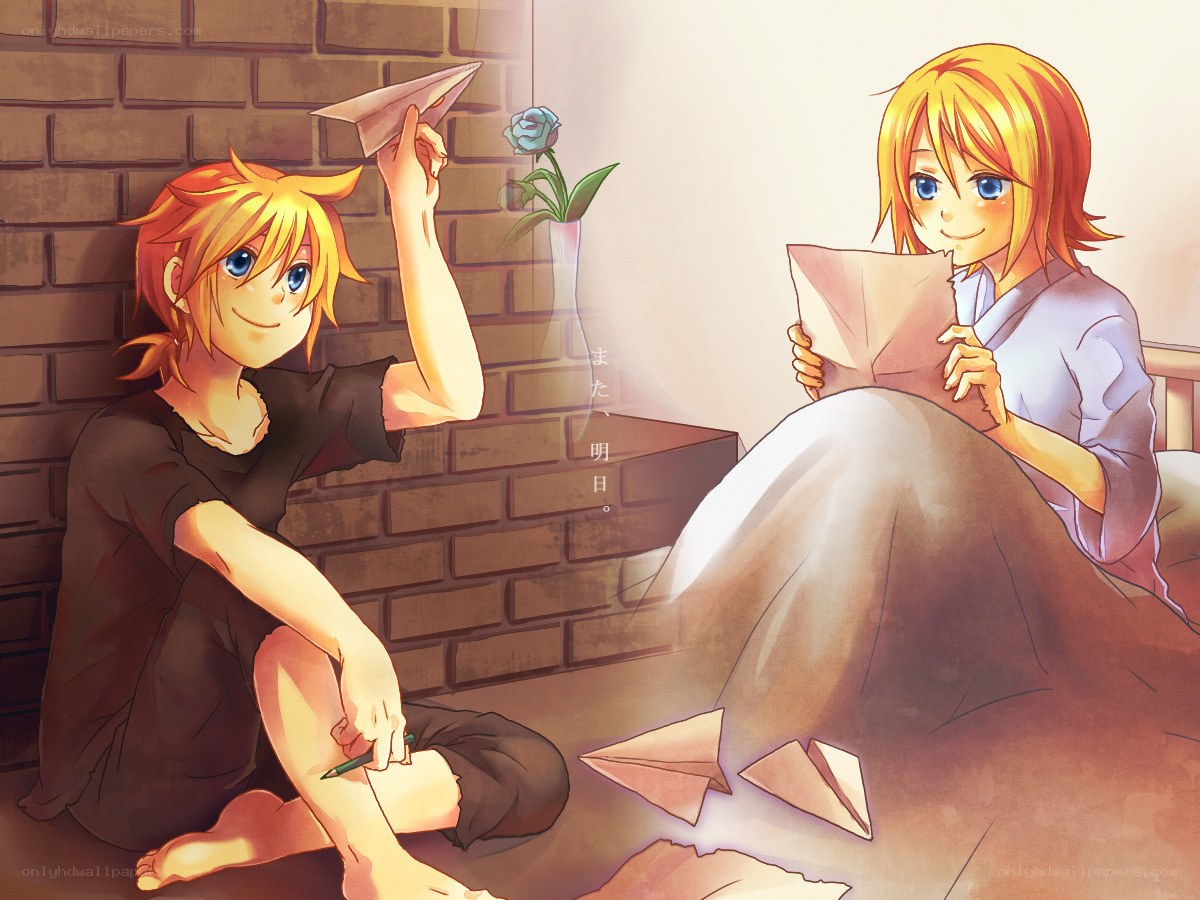 Two boys with paper airplanes