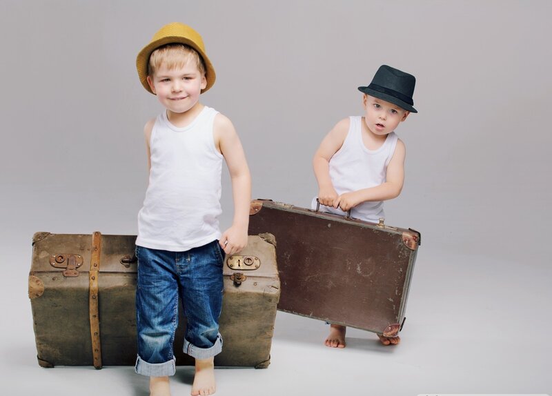 Two Boys with Suitcases