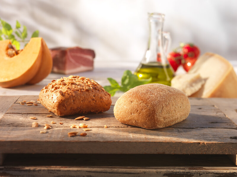 Two Bread Rolls on Wood