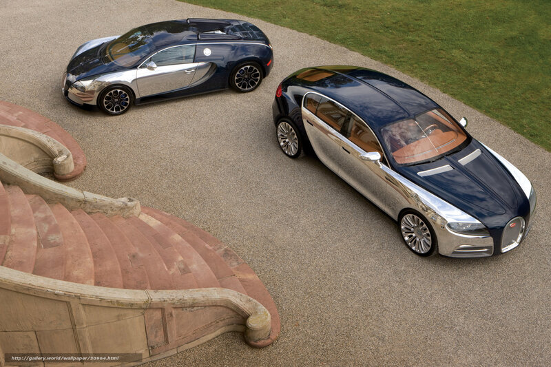 Two Bugatti cars on a driveway