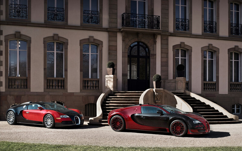 Two Bugatti Veyrons — Red