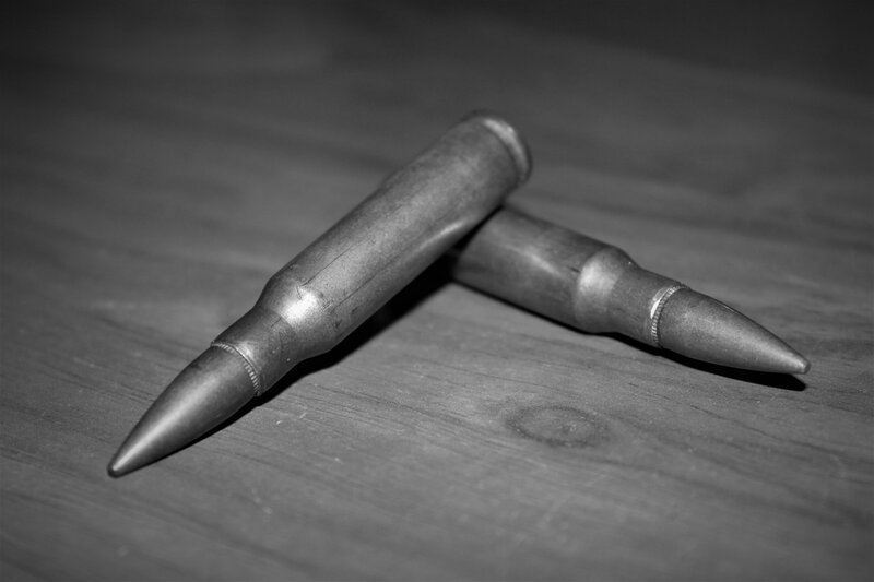 Two Bullets on Wood