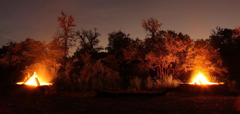 Two Campfires at Night