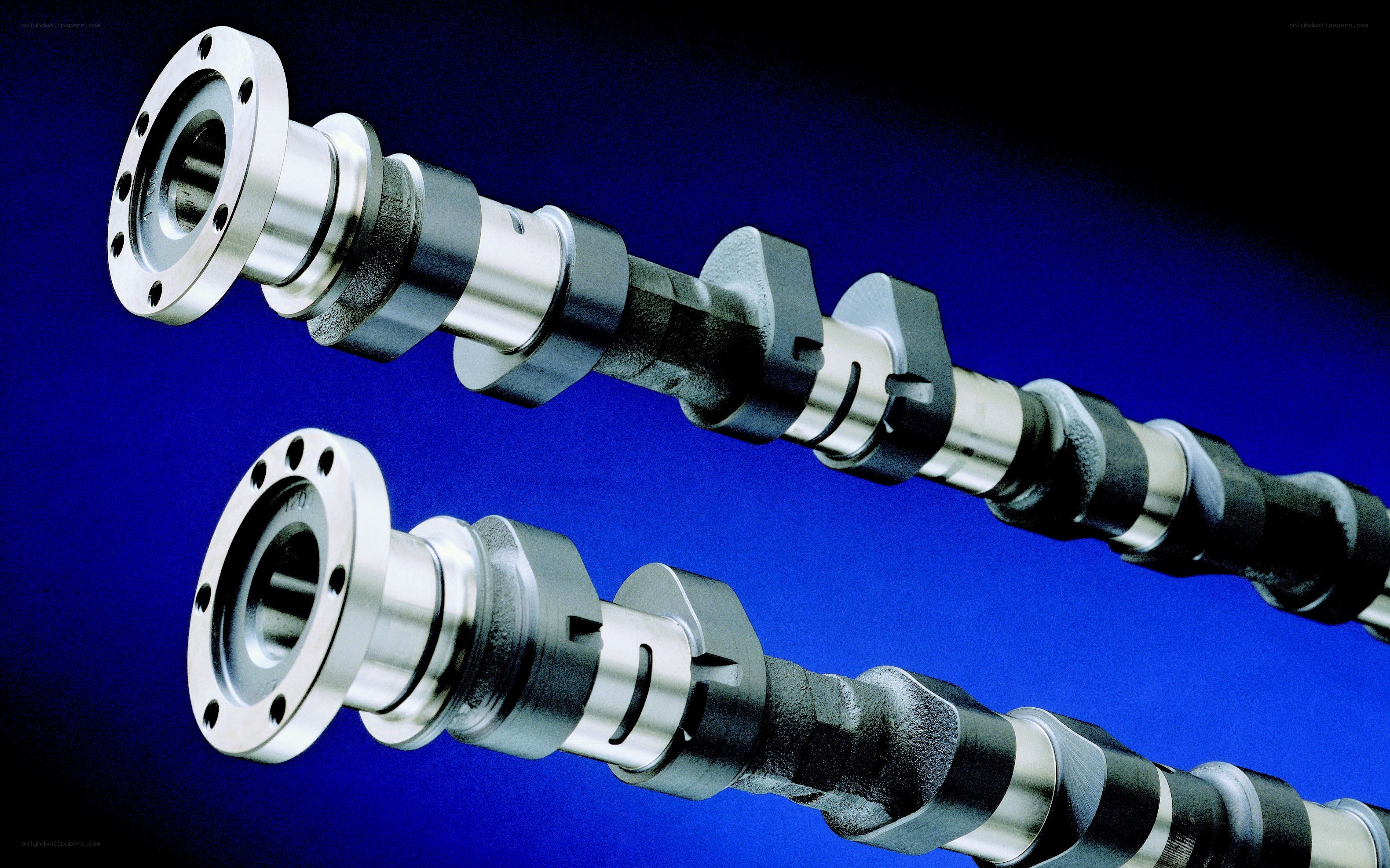 Two camshafts on blue background