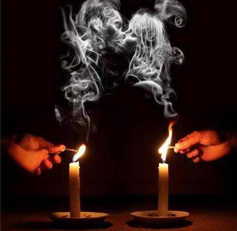 Two Candles Being Lit