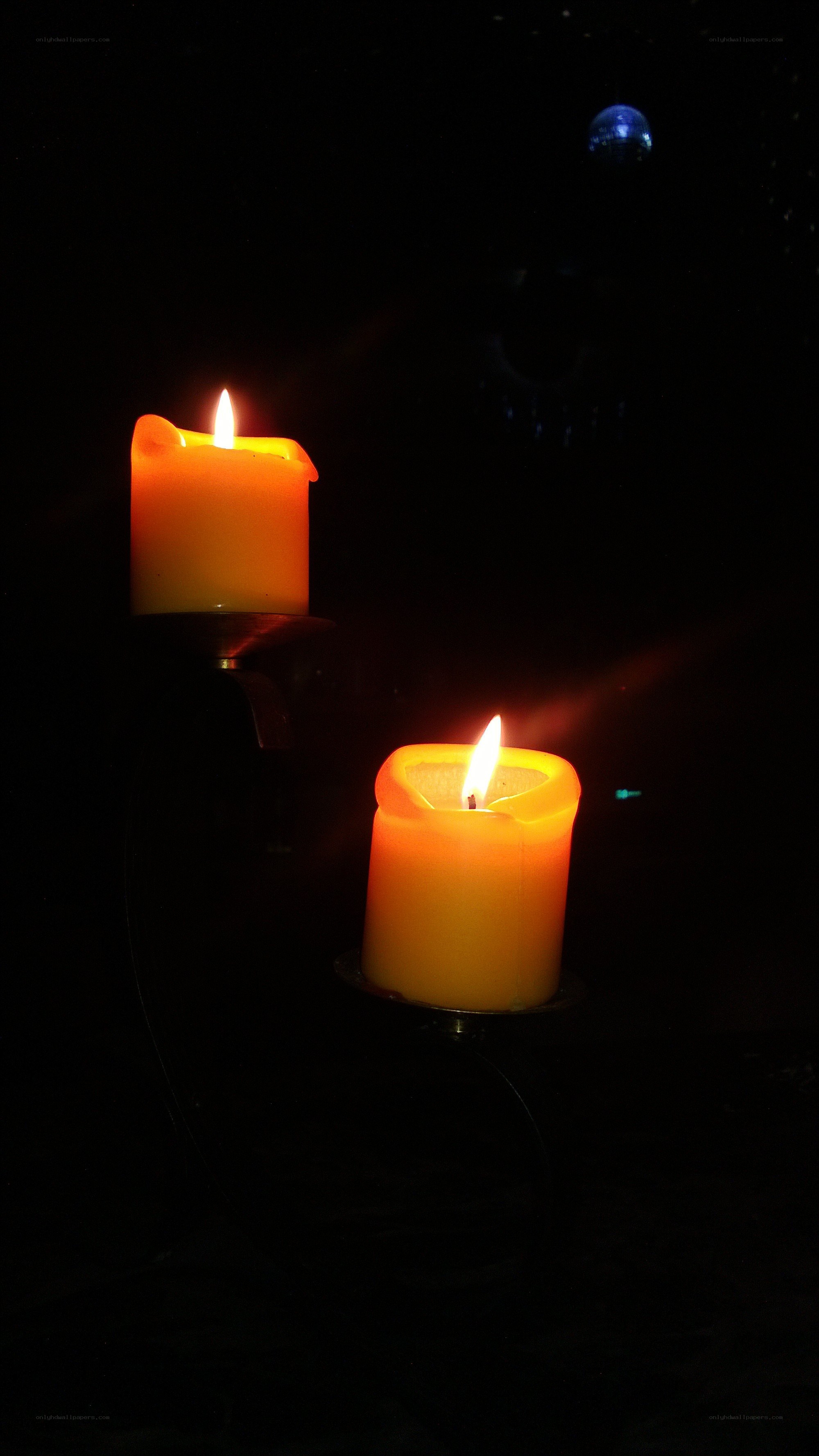 Two candles in the dark