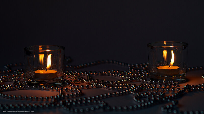 Two candles with beads