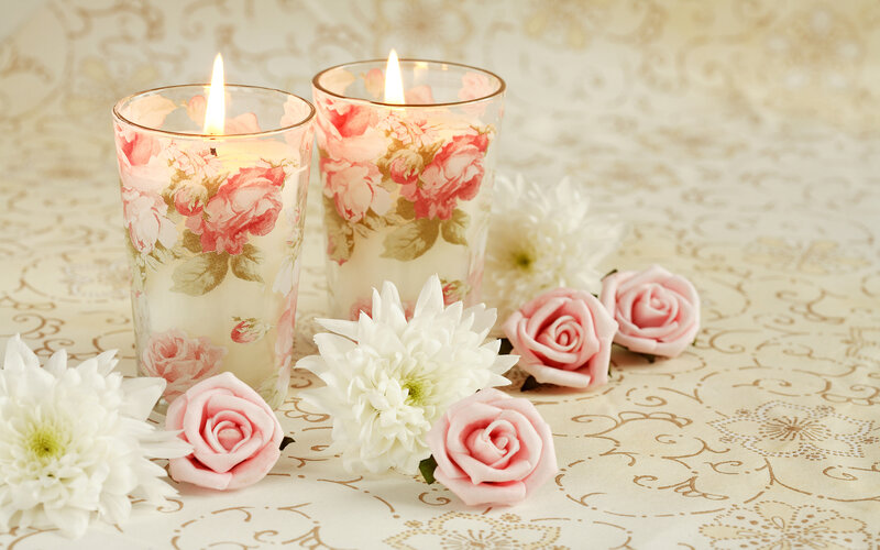 Two Candles with Flowers