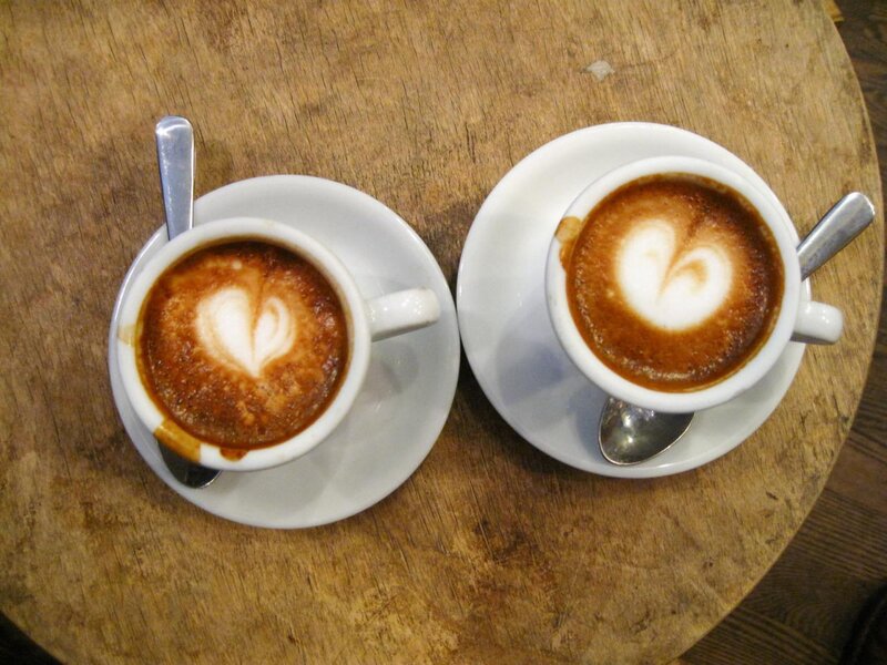 Two Cappuccinos on Table