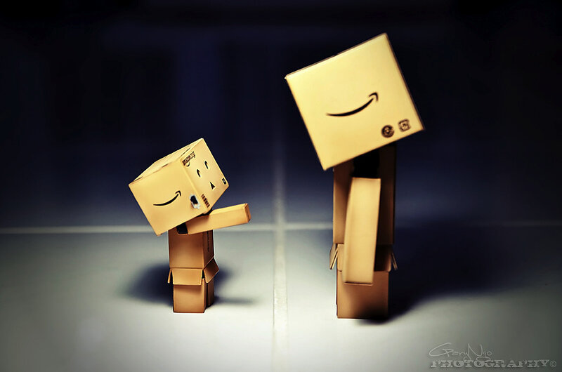 Two cardboard box figures